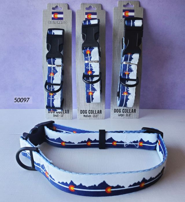 50097-07 Colorado Souvenir Dog Collars, design is Colorado Mountains graphic with flag icon repeating. Heavy duty black plastic hardware.  Three assorted sizes, sm, med and lg within the assortment. 