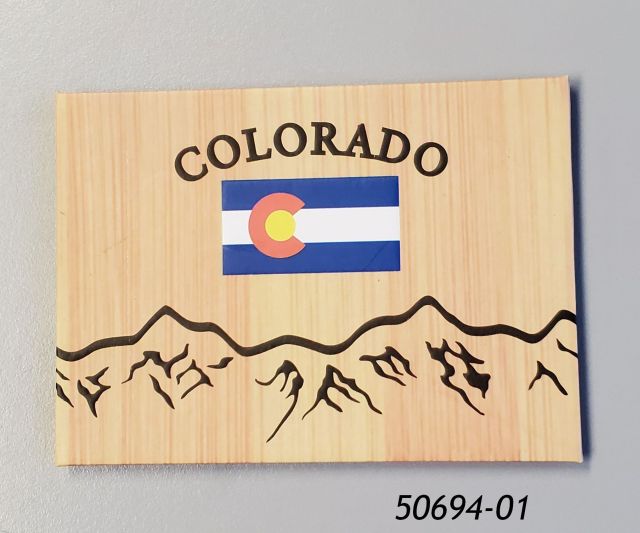 50694-01 Colorado souvenir magnet with wood grain look, flag and mountains graphic. 