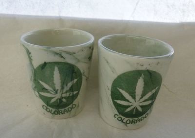 Souvenir green marble ceramic shot with Colorado Pot Leaf design