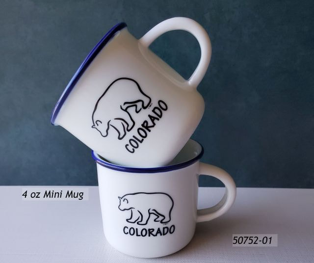 50752-01 Colorado Souvenir mini mug, shaped like a campfire mug, but white porcelain w blue trim.  Black bear sketch design reads Colorado