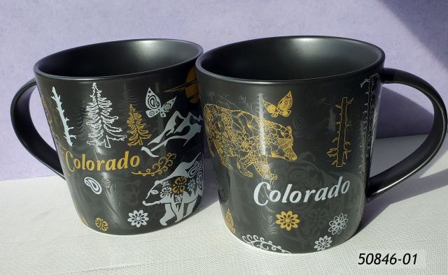 50846-01 Colorado Black Matte Tapered mug with matte gold, white and tonal grey imprint with bears, butterflies, flowers and other Colorado souvenir motifs