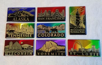 Custom souvenir magnet with vivid color foil background and aluminum cutout design. 